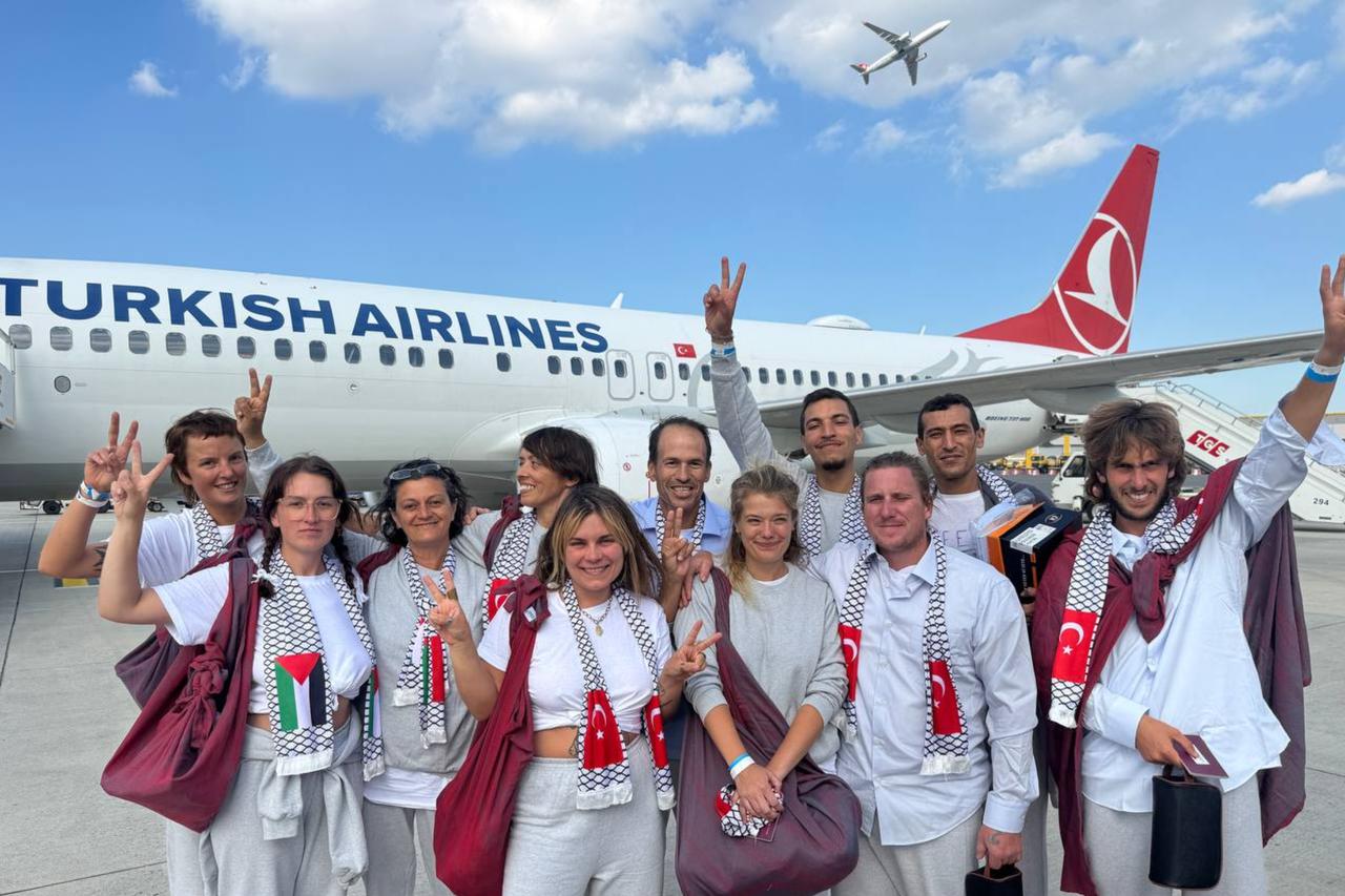 Turkish Airlines flight brings 94 activists, including 18 Turks, from the Freedom Flotilla Coalition, which were seized by Israel in international waters to Istanbul, Turkiye, on Oct. 10, 2025. (AA Photo)