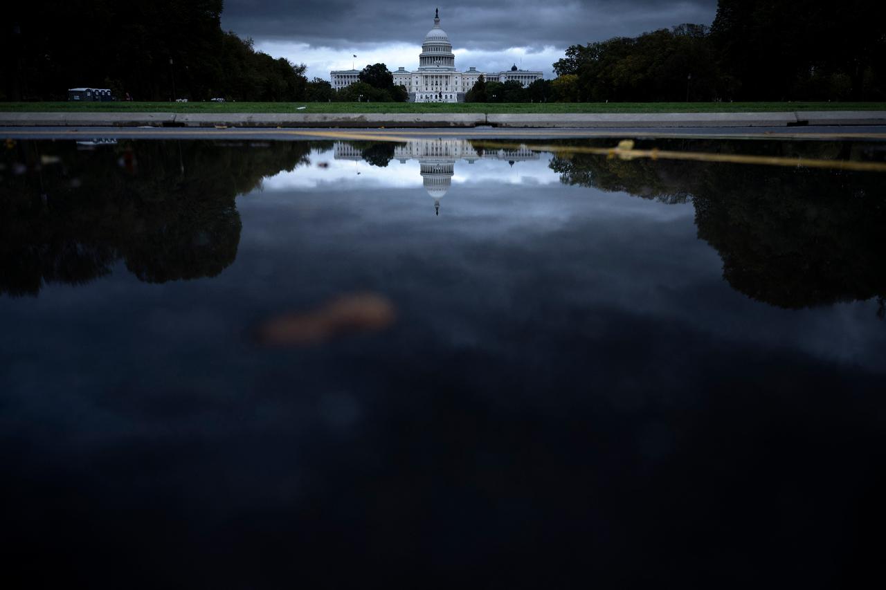 A view of the U.S. Capitol building following rain showers on the eighth day of the federal government shutdown, Washington, on Oct 8, 2025. (AFP Photo)
