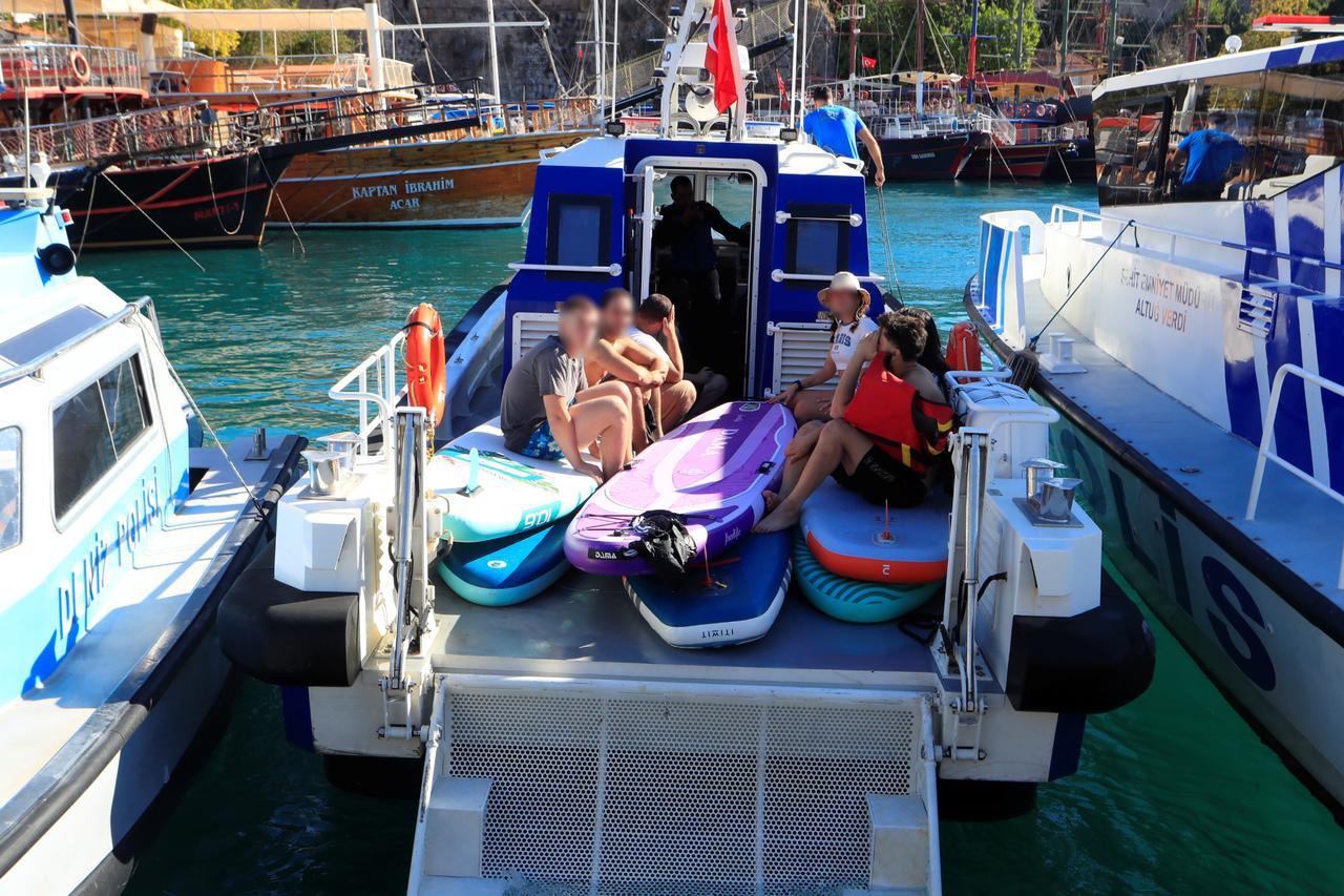 Students rescued after being blown offshore while paddleboarding off Konyaalti Beach in Antalya, Türkiye, Oct. 12, 2025. (IHA Photo)