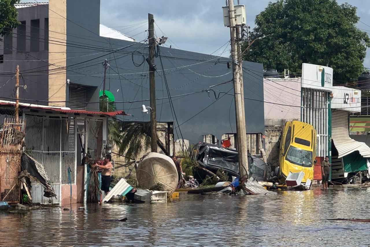 A flooded street with debris caused by heavy rains in Poza Rica, Mexico, 10 October 2025.  (EPA/IHA Photo)