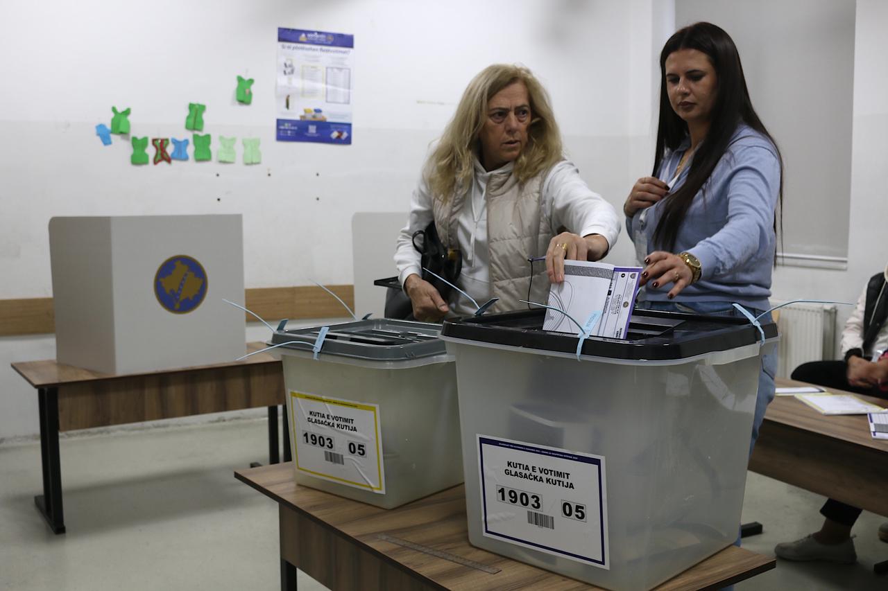 Citizens gather to cast their vote at a polling station to elect mayors and municipal assembly members in Pristina, Kosovo on Oct. 12, 2025. (AA Photo)