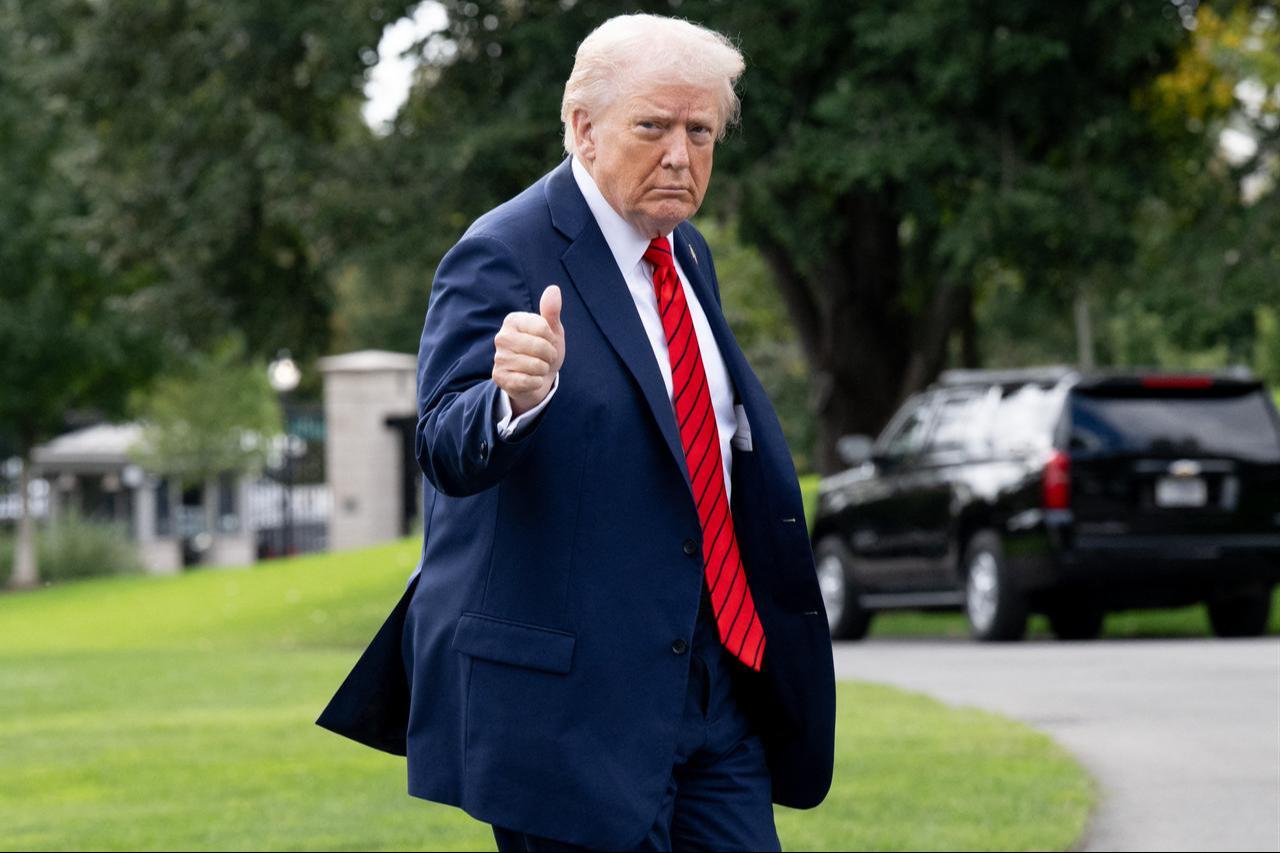 US President Donald Trump gestures as he walks on the South Lawn of White House, Oct. 10, 2025, in Washington, DC. (AFP Photo)