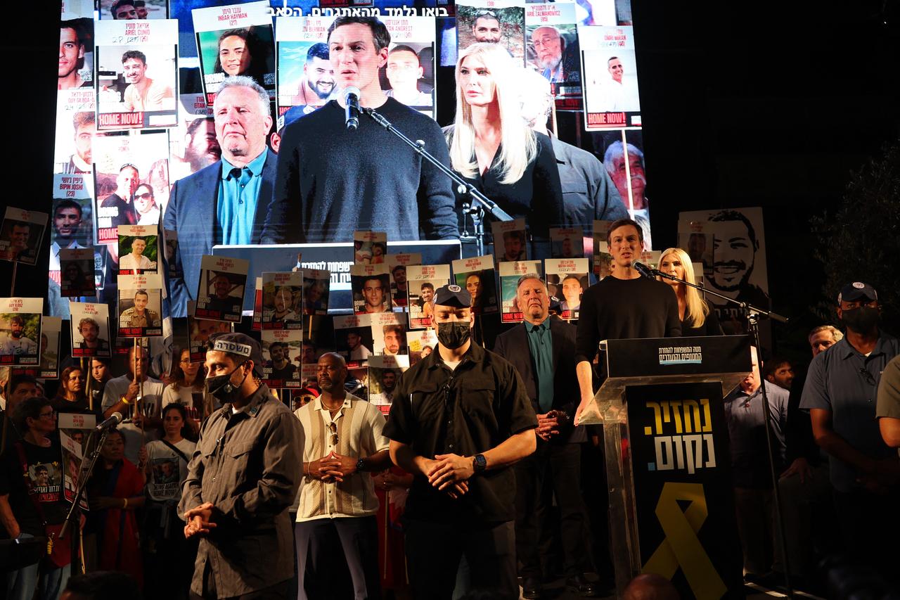 U.S. businessman Jared Kushner speaks as his wife Ivanka Trump and US special envoy Steve Witkoff look on during a gathering at Hostages Square in Tel Aviv, Israel on Oct. 11, 2025.