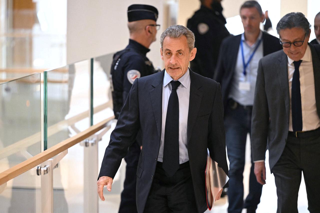 Former French president Nicolas Sarkozy arrives for a hearing in his trial on charges of illegal campaign financing from Libya for his successful 2007 presidential bid, at the Tribunal de Paris courthouse in Paris, March 25, 2025. (AFP Photo)