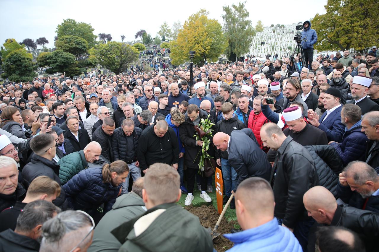 Mourners gather to pay their respects at the funeral of Halid Beslic, at Bare Cemetery in Sarajevo, Bosnia and Herzegovina, October 13, 2025. (AA Photo)
