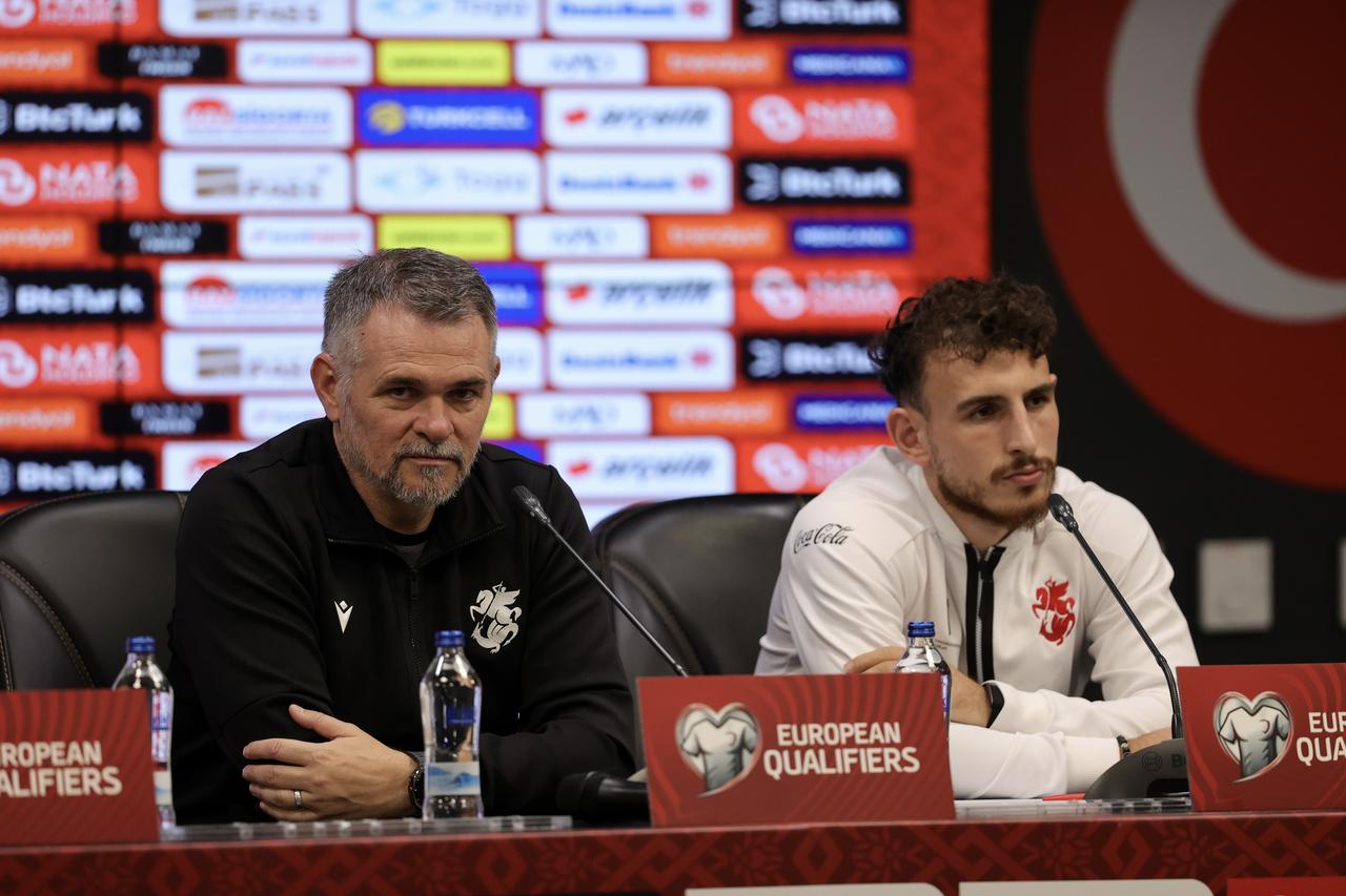 Georgia national team head coach Willy Sagnol (L) and midfielder Anzor Mekvabishvili (R) speak at a press conference held at Kocaeli Stadium ahead of their UEFA Euro 2026 Qualifiers Group E match in Kocaeli, Türkiye on Oct. 13, 2025. (AA Photo)