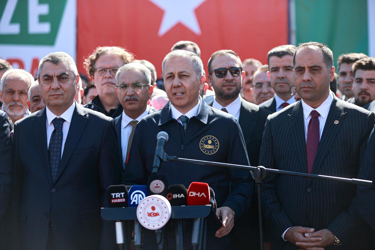 Türkiye’s Interior Minister Ali Yerlikaya (center) delivers a speech during the send-off ceremony of the 17th “Goodness Ship” at Mersin International Port on Oct. 14, 2025. (AA Photo)