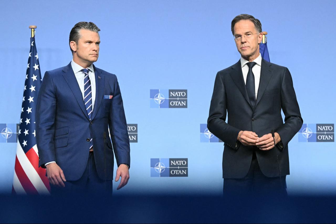 US Defense Secretary Pete Hegseth (L) and NATO Secretary General Mark Rutte speak to the press at NATO headquarters in Brussels, Oct. 15, 2025. (AFP Photo)