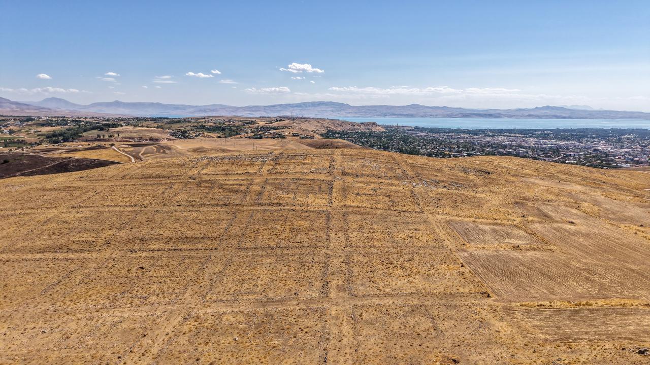 Aerial view of Zernaki Hill overlooking Ercis and Lake Van, showing the clear grid plan of the ancient settlement extending across the plateau, Oct. 8, 2025. (AA Photo)