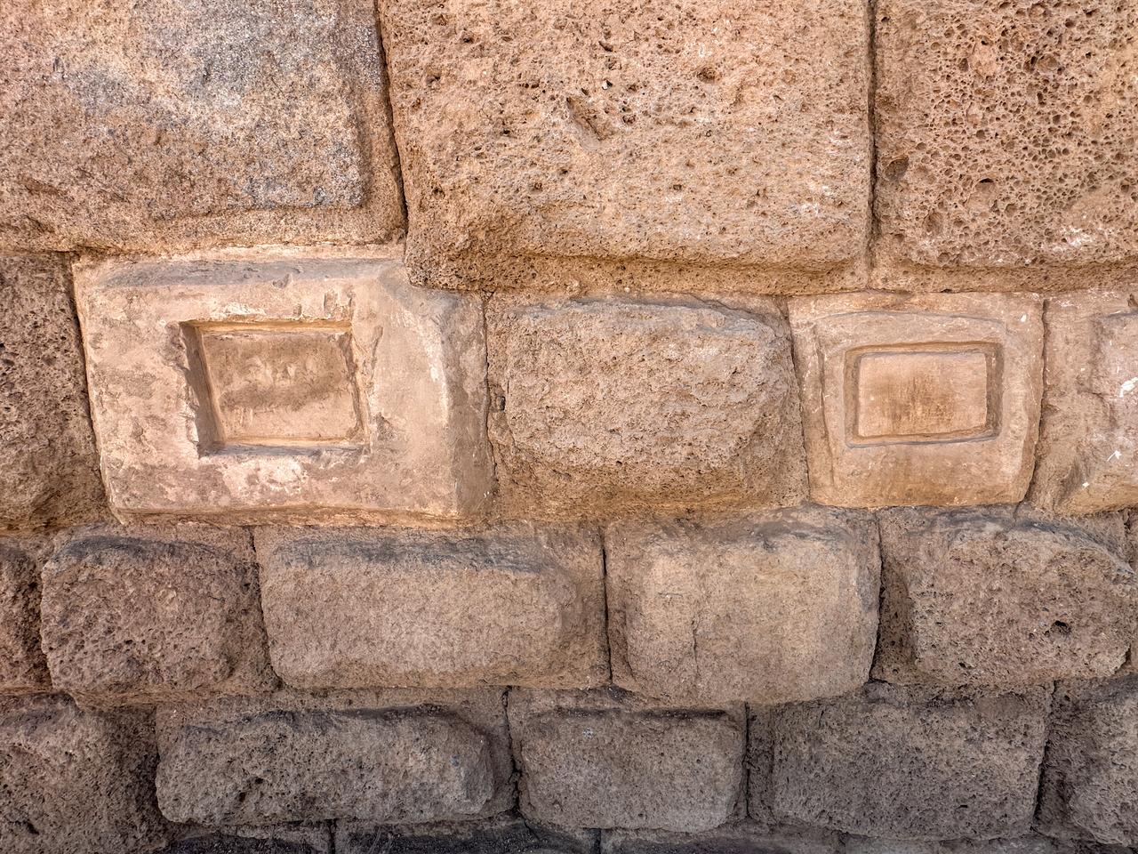 Two of the Aramaic inscriptions carved into basalt and limestone blocks on the ancient fortification walls at Zernaki Hill in Van’s Ercis district, eastern Türkiye, Oct. 8, 2025. (AA Photo)