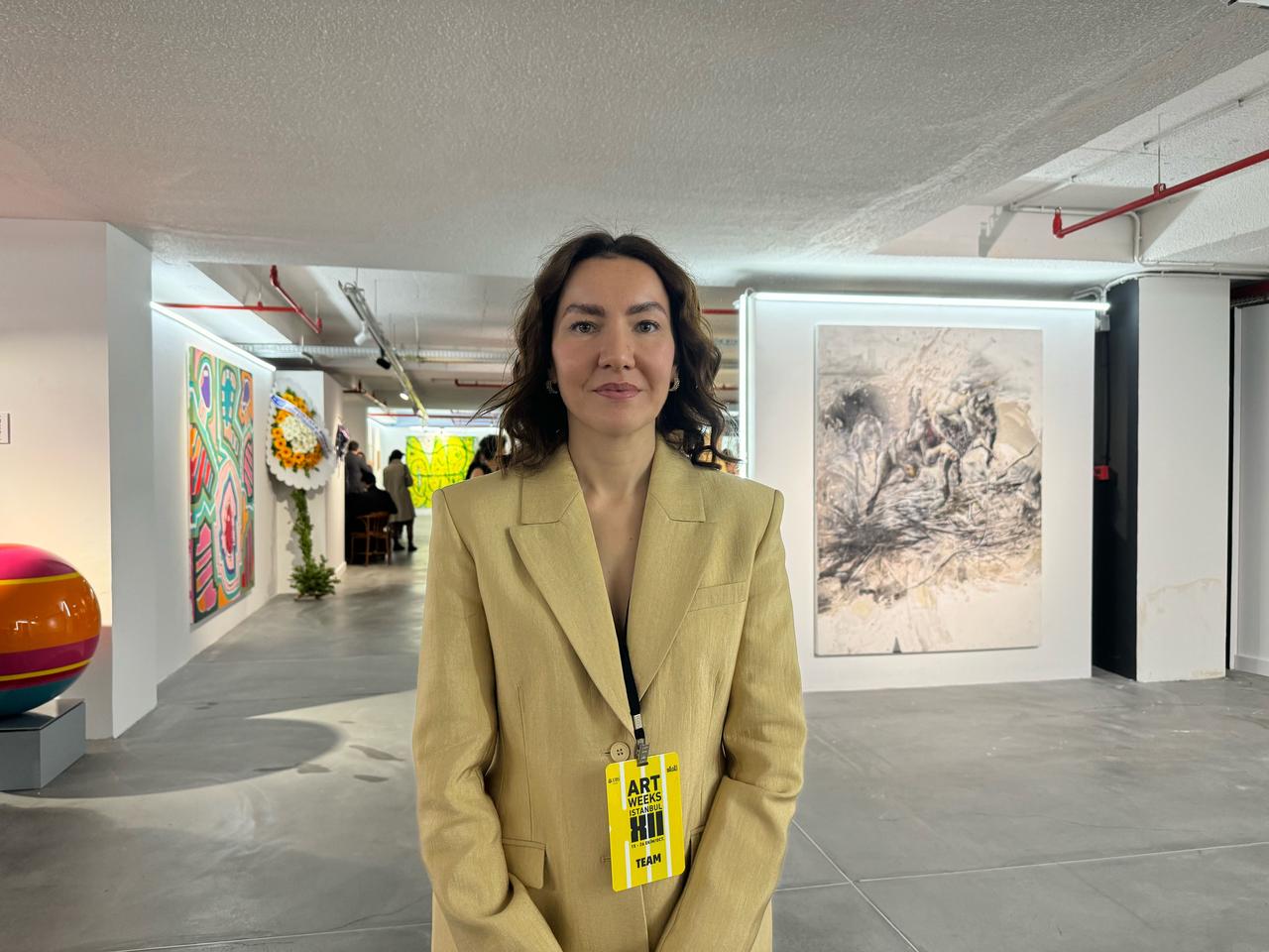 Begum Guney, Director of Art and Culture at Bilgili Holding, poses during the opening of Artweeks Istanbul’s 12th edition, Oct. 15, 2025. (AA Photo)