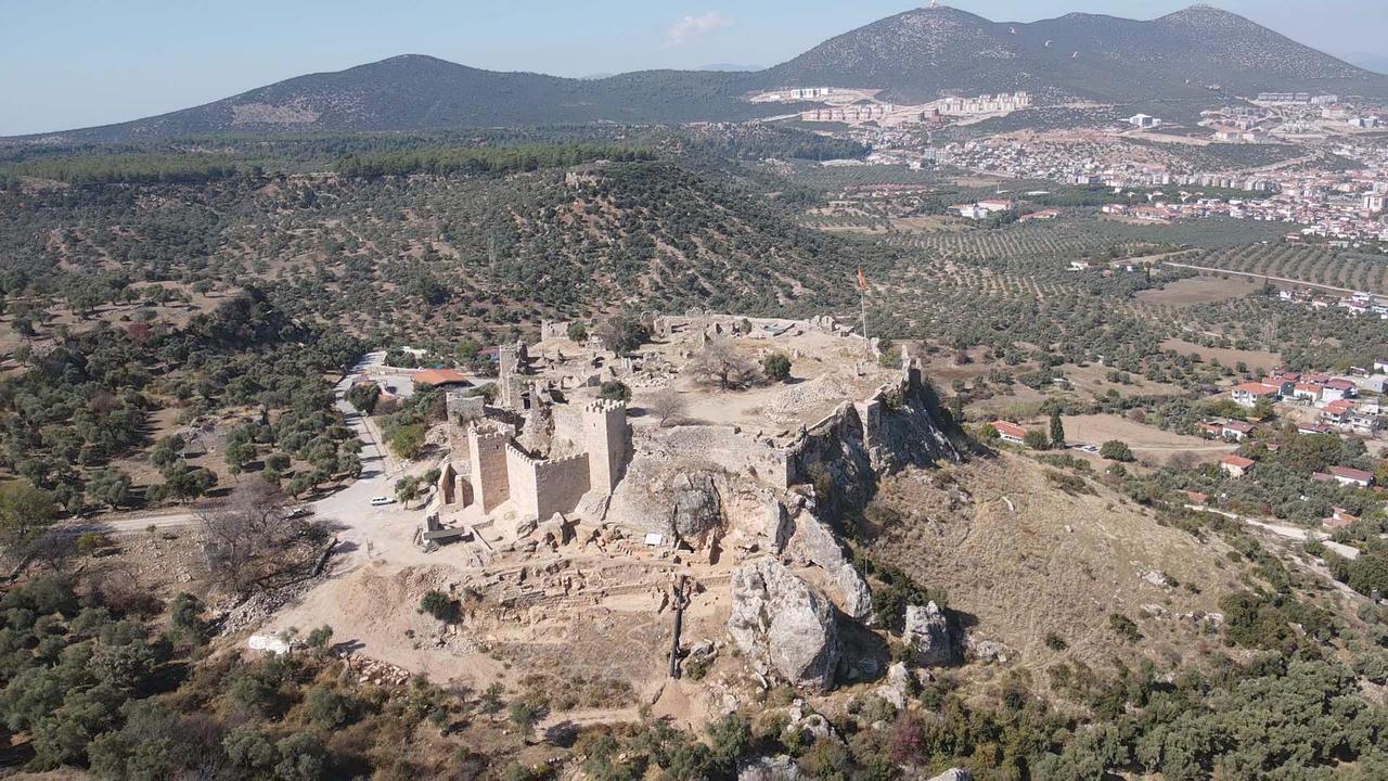 Aerial view of the ancient city of Becin in Milas, Mugla, Türkiye, where 700-year-old millet seeds were unearthed during ongoing excavations, Oct. 16, 2025. (AA Photo)
