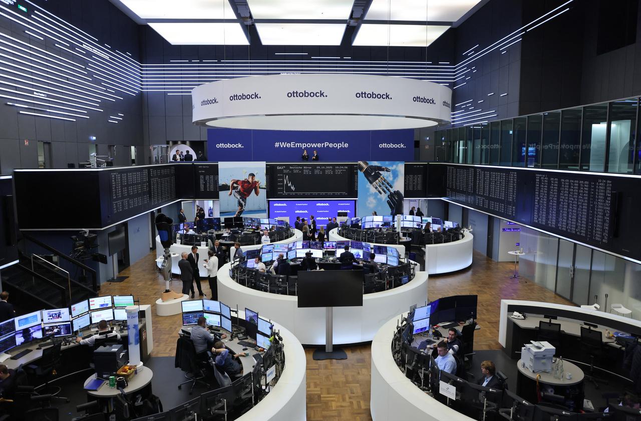 Brokers work at the stock exchange in Frankfurt, western Germany, on Oct. 9, 2025. (AFP Photo)