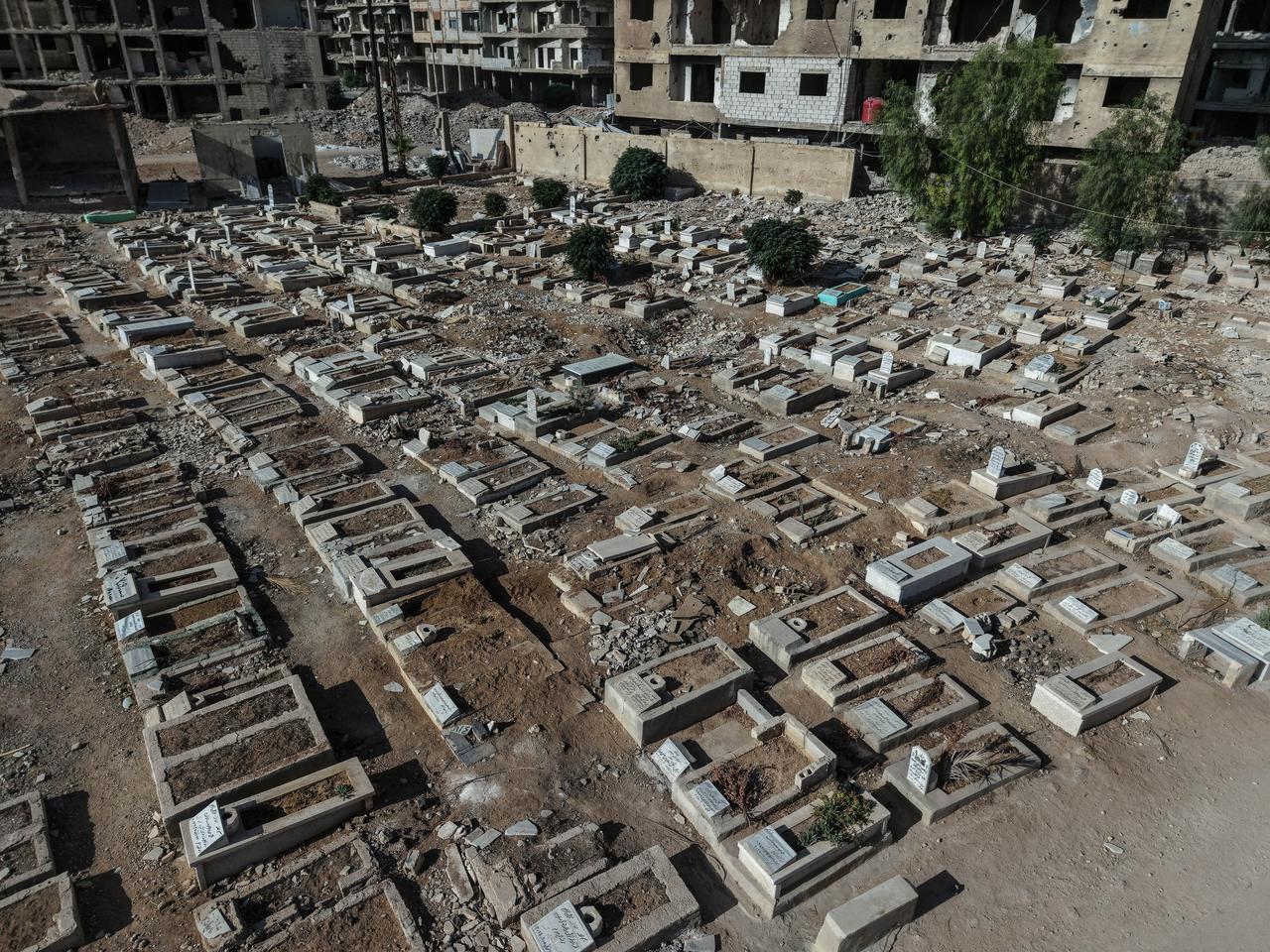 An aerial view of the Yarmouk Cemetery, which was destroyed by the ousted Bashar al-Assad regime and its supporters in Damascus, Syria on Sept. 23, 2025. (AA Photo)