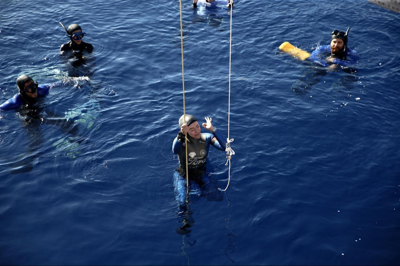 Turkish athlete Sahika Ercumen completes her world record dive in the variable-weight no-fins category under the supervision of safety divers in Kas, Antalya, Türkiye, Oct. 17, 2025. (AA Photo)