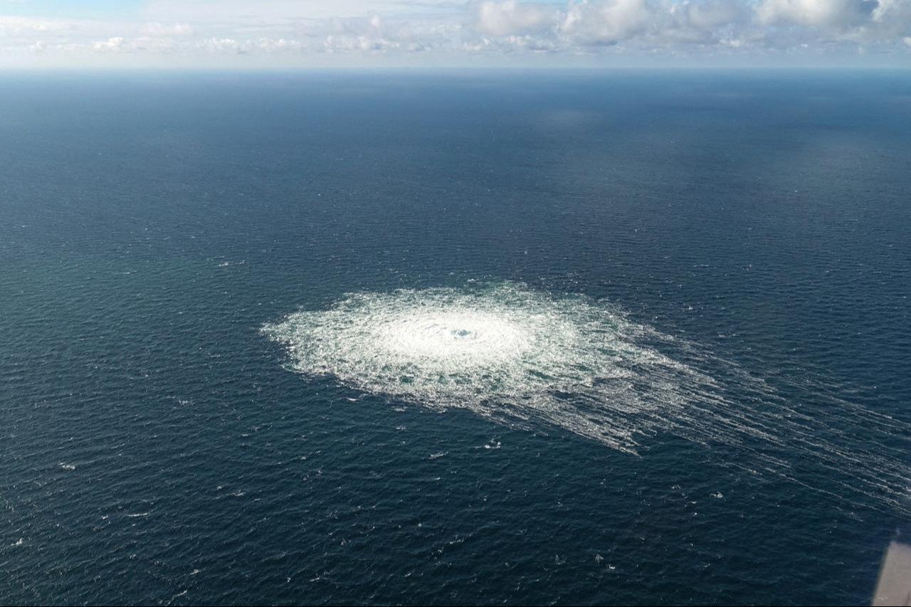 Gas leak from Nord Stream 2 pipeline as seen from an Danish F-16 interceptor jet over Bornholm island, Denmark, September 27, 2022. (Photo by Ritzau Scanpix via Reuters)