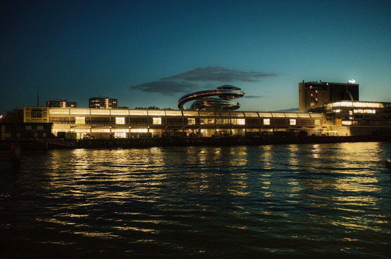The Fenix museum and its Tornado viewing platform are seen illuminated from the Maas River in Rotterdam, Netherlands, accessed May 14, 2025. (Courtesy of Fenix Museum)