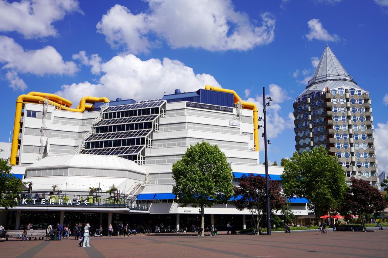 Rotterdam cityscape with Central Library of Rotterdam (left) and Blaaktoren (right), Rotterdam, Netherlands, accessed October 18.2025. (Adobe Stock Photo)