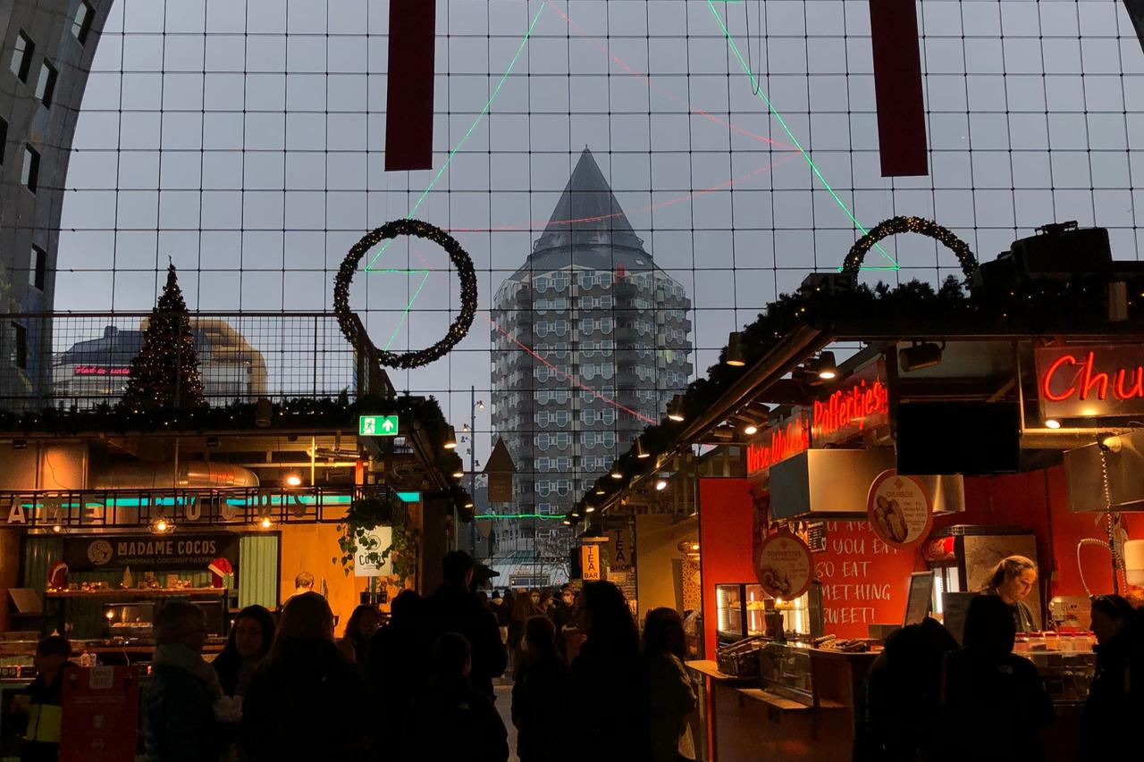 Evening view inside the Markthal with the Blaak tower visible through its glass arch, Rotterdam, Netherlands, December 2024. (Photo by Selin Hacialioglu/Türkiye Today)