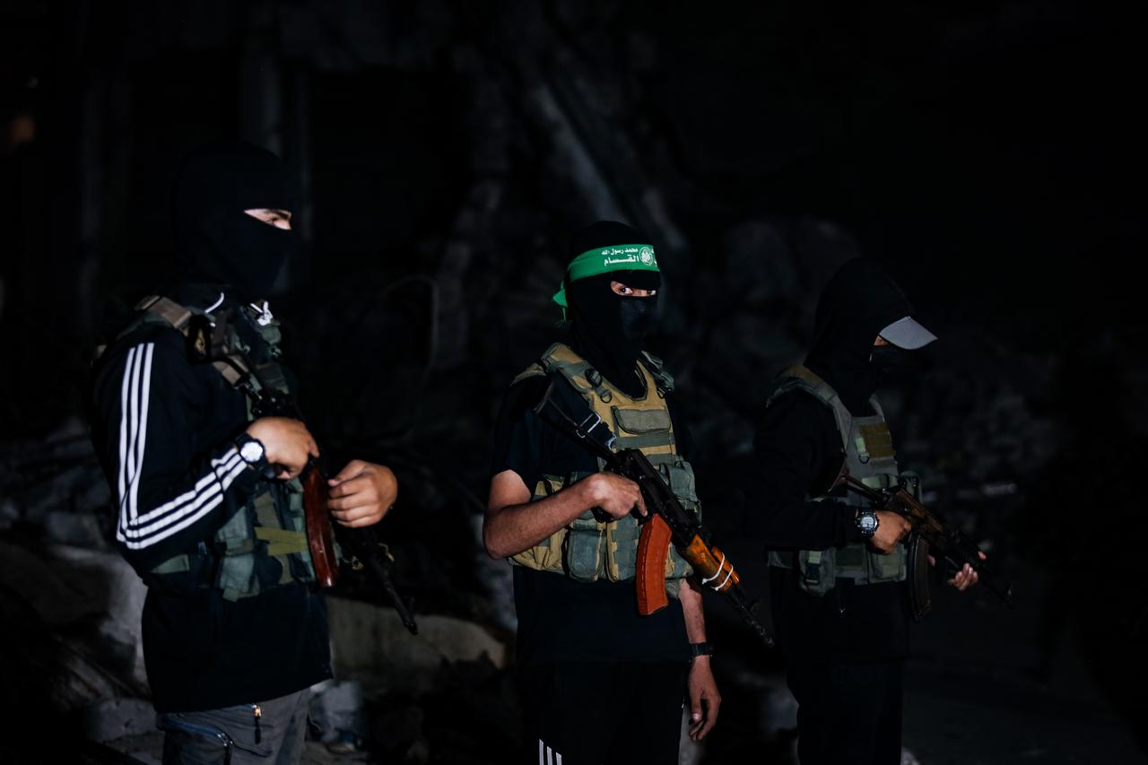 Bodies of Israeli hostages are handed over to International Committee of the Red Cross (ICRC) by the Al-Qassam Brigades, armed wing of Hamas in Gaza City, Gaza, Oct. 15, 2025. (AA Photo)