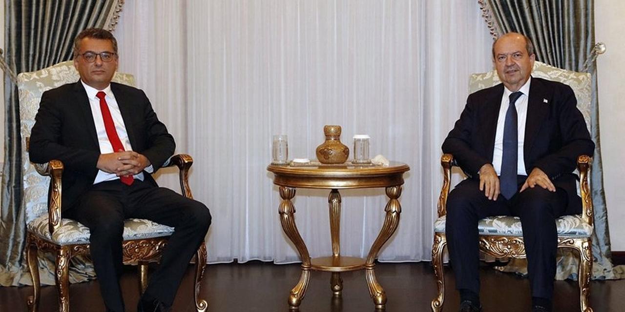 TRNC head Ersin Tatar (R) sits together with CTP head Tufan Erhurnan, Nov. 20, 2020. (AA Photo)