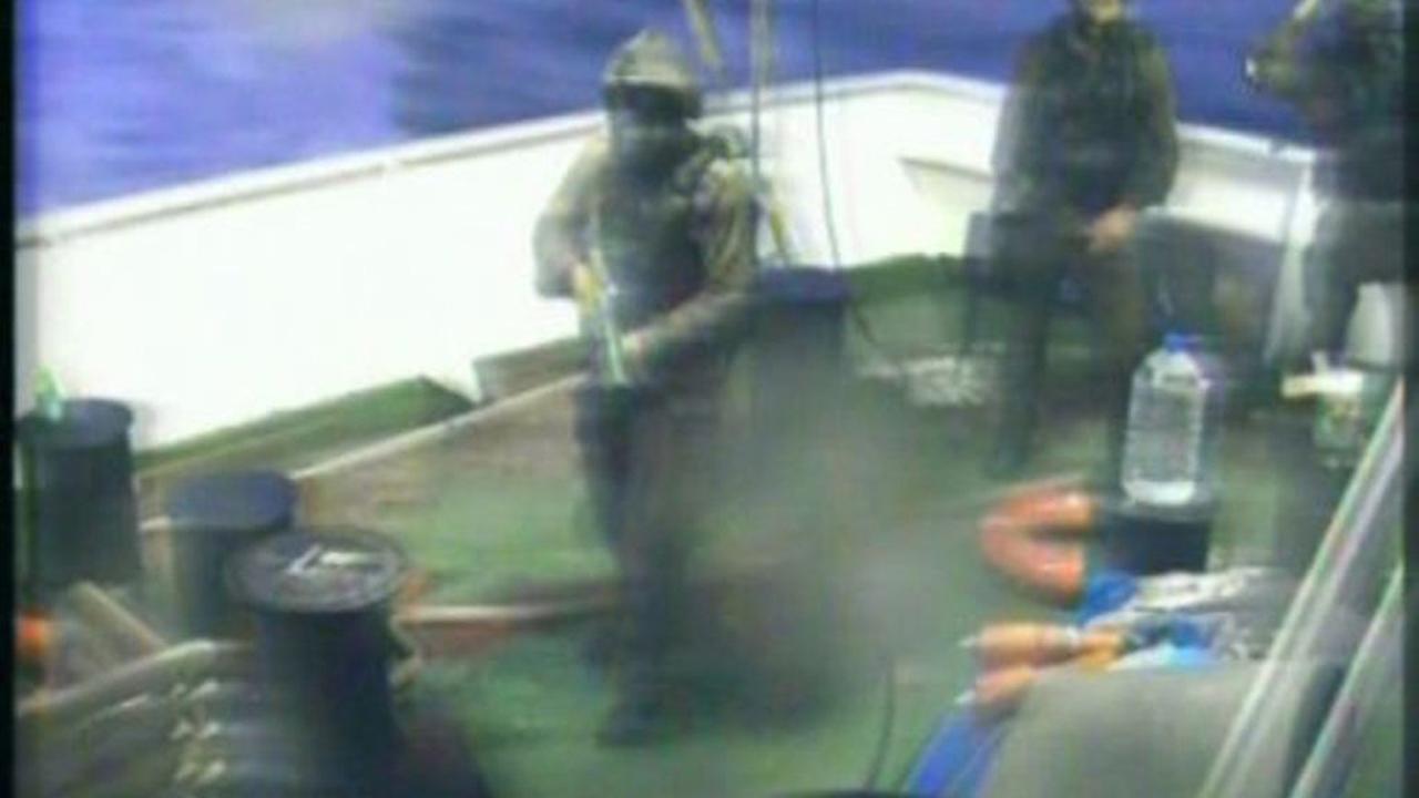 A television grab made from the Turkish TV channel Cihan News Agency shows Israeli Navy troops storming the "Mavi Marmara" Turkish aid boat, carrying aid to the Gaza Strip, on May 30, 2010. (AFP Photo)
