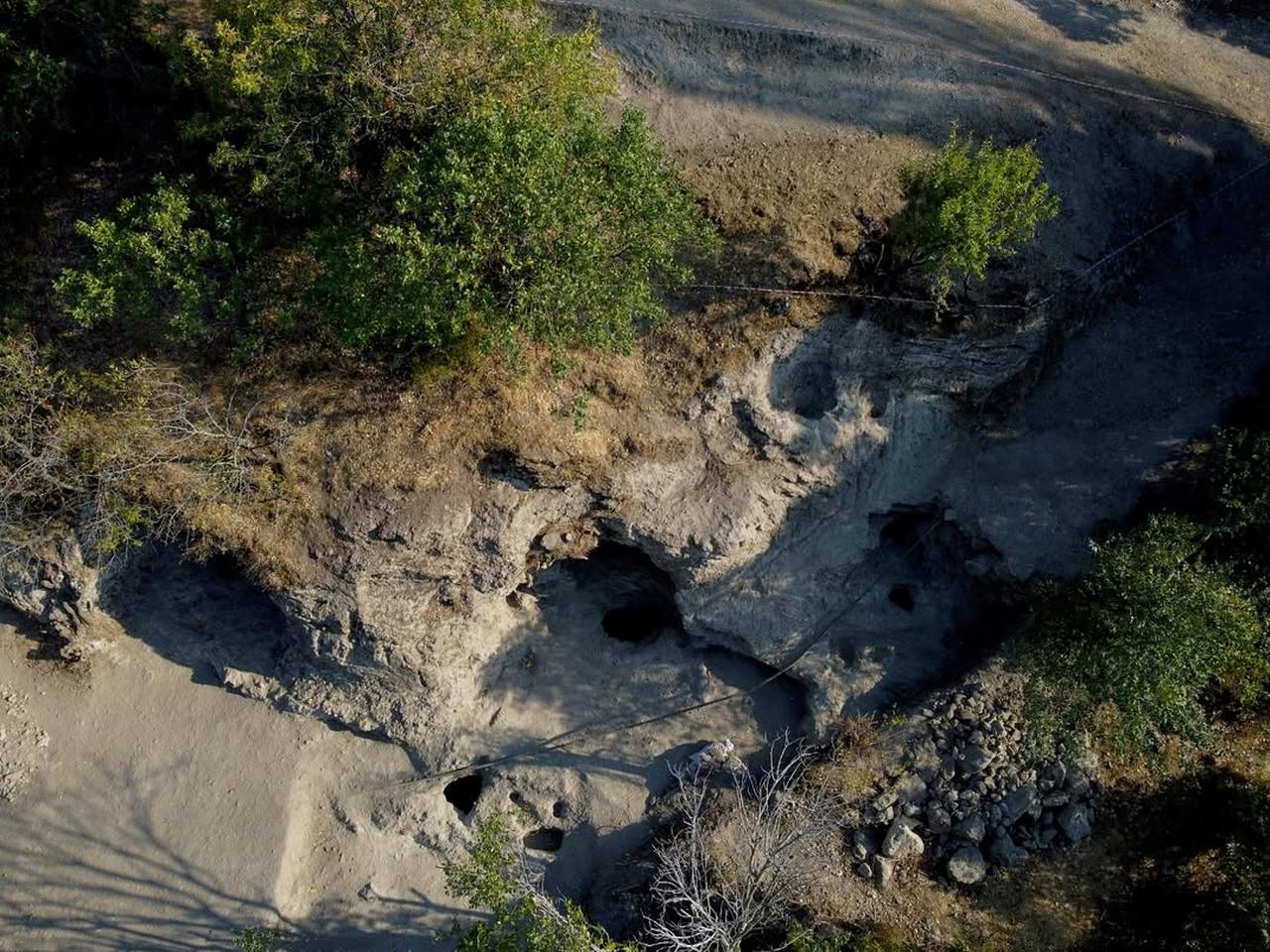 An aerial view showing the excavation zone with sacred caves and ritual structures at Attouda in Denizli, Türkiye, Oct. 1, 2025. (Photo via Instagram/@arkeolojihaber)