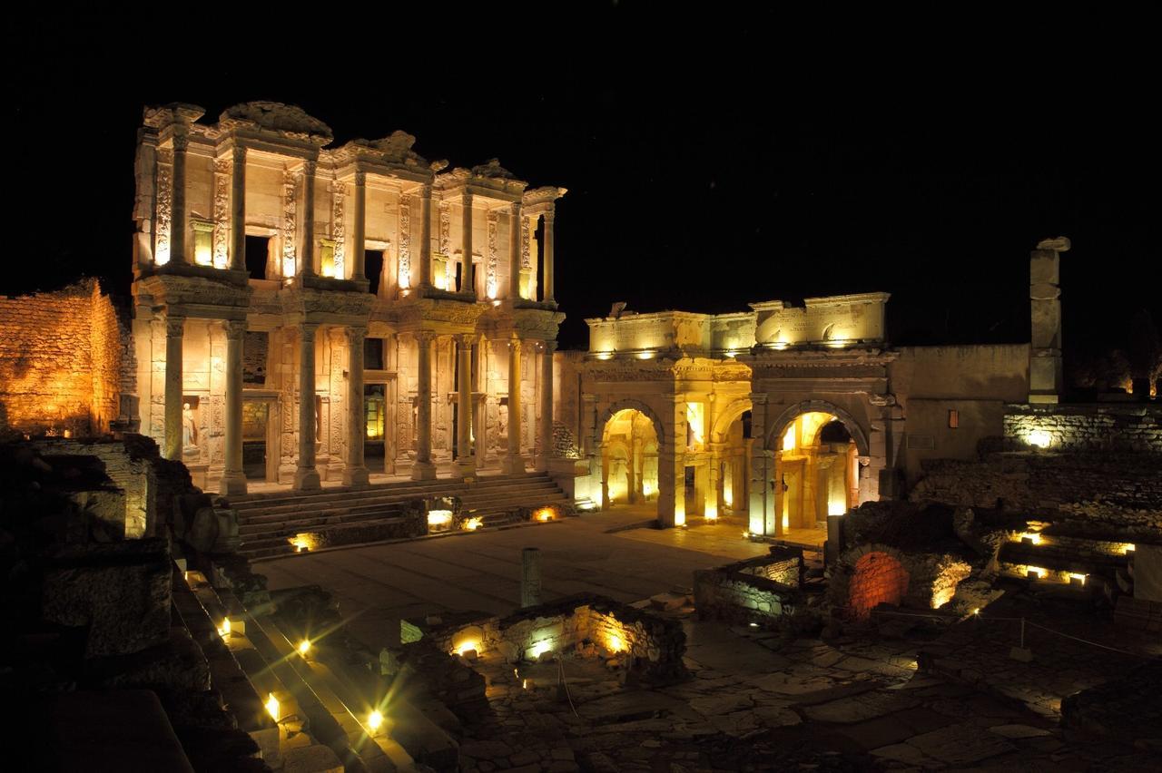 The illuminated facade of the Library of Celsus in Ephesus during nighttime museum visits, Izmir, Türkiye, October 2, 2025. (AA Photo)