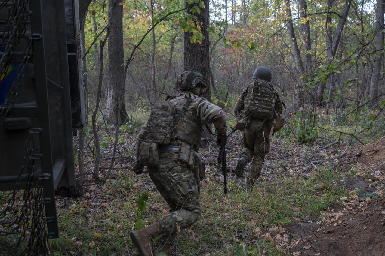 Ukrainian soldiers conduct tactical training with a Tigr armored vehicle near the front line in the Kharkiv region, Ukraine, on Sept. 30, 2025. (AA Photo)