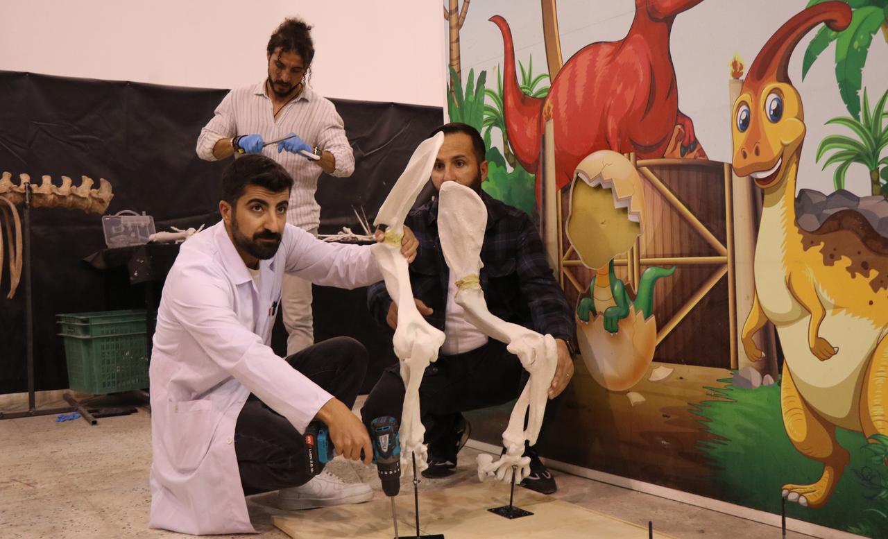 Researchers in Kayseri assemble reconstructed fossil limbs using 3D-printed components during restoration work. (AA Photo)