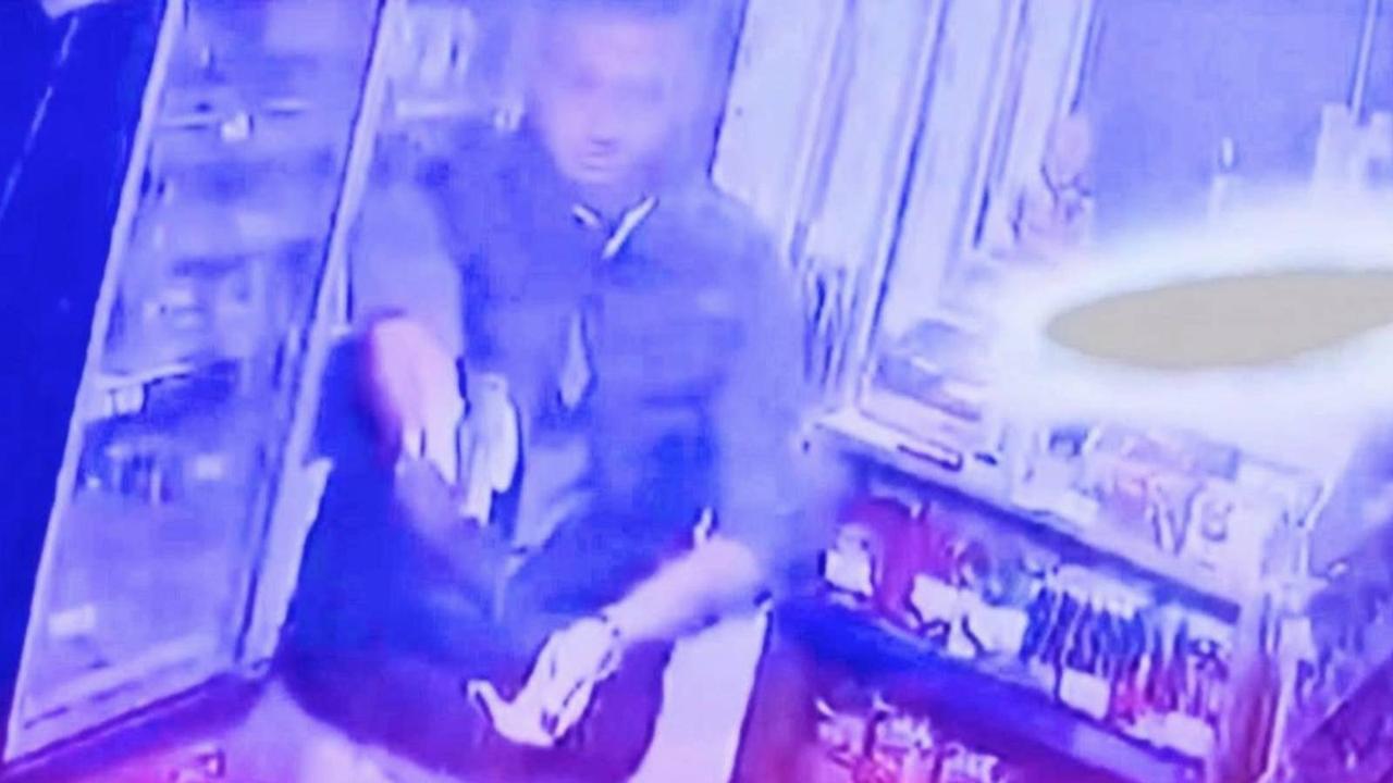 Security camera footage shows the escaped convict opening fire inside a grocery store in Edremit, Balikesir, moments before fleeing the scene. (Photo via T24)