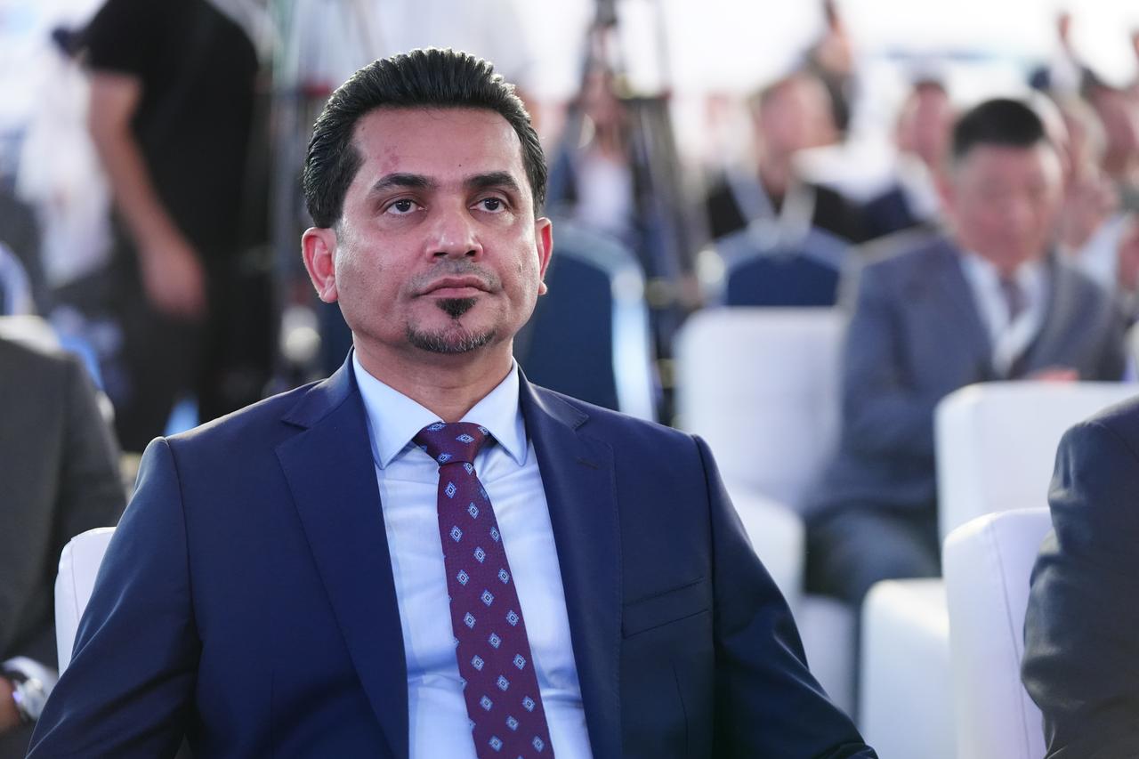 Iraqi Minister of Transport Razzaq Muhaibis al-Saadawi attends an event as he states that Turkiye has an important and active role in the Development Road Project in Baghdad, Iraq, on Oct. 22, 2025. (AA Photo)