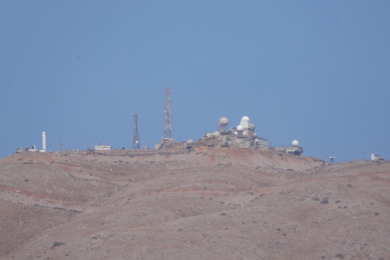 A view of the Israeli military posts established in the Quneitra region, along with the construction equipment used during these operations, seen from Quneitra, Syria, Oct. 20, 2025. (AA Photo)
