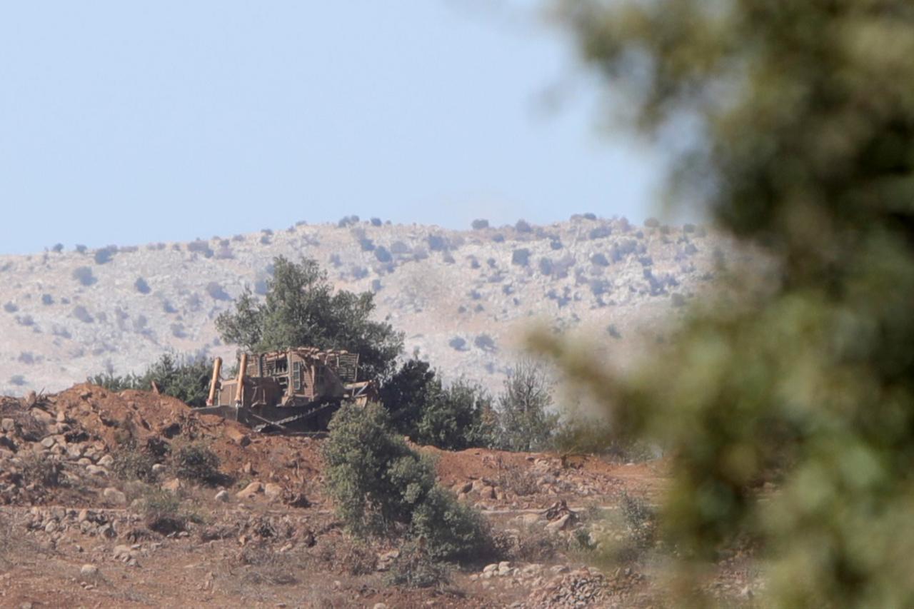 A view of the Israeli military posts established in the Quneitra region, along with the construction equipment used during these operations, seen from Quneitra, Syria, Oct. 20, 2025. (AA Photo)