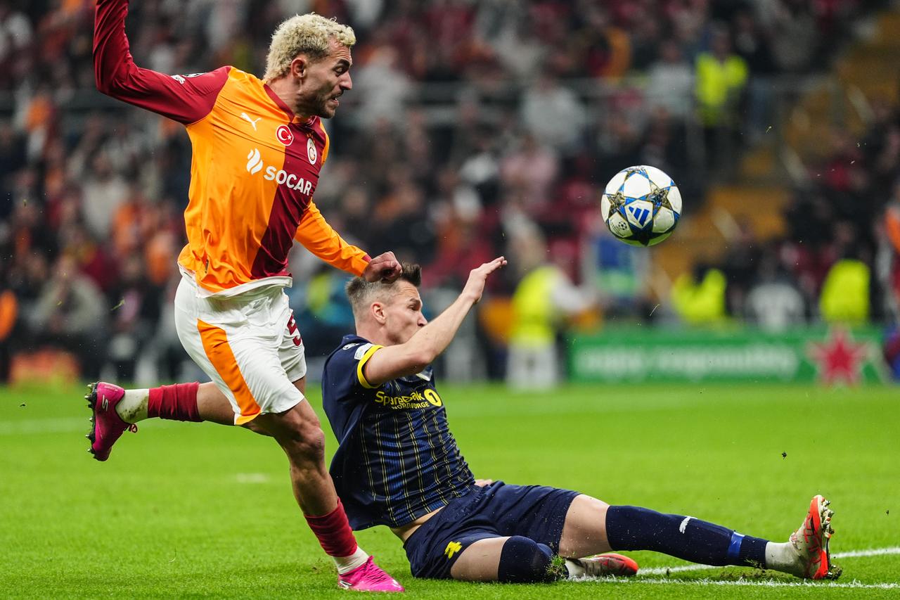Baris Alper Yilmaz of Galatasaray in action against Odin Luras Bjortuft of Bodo/Glimt during the UEFA Champions League third-week football match between Galatasaray and Bodo/Glimt at RAMS Park in Istanbul, Türkiye on Oct. 22, 2025. (AA Photo)