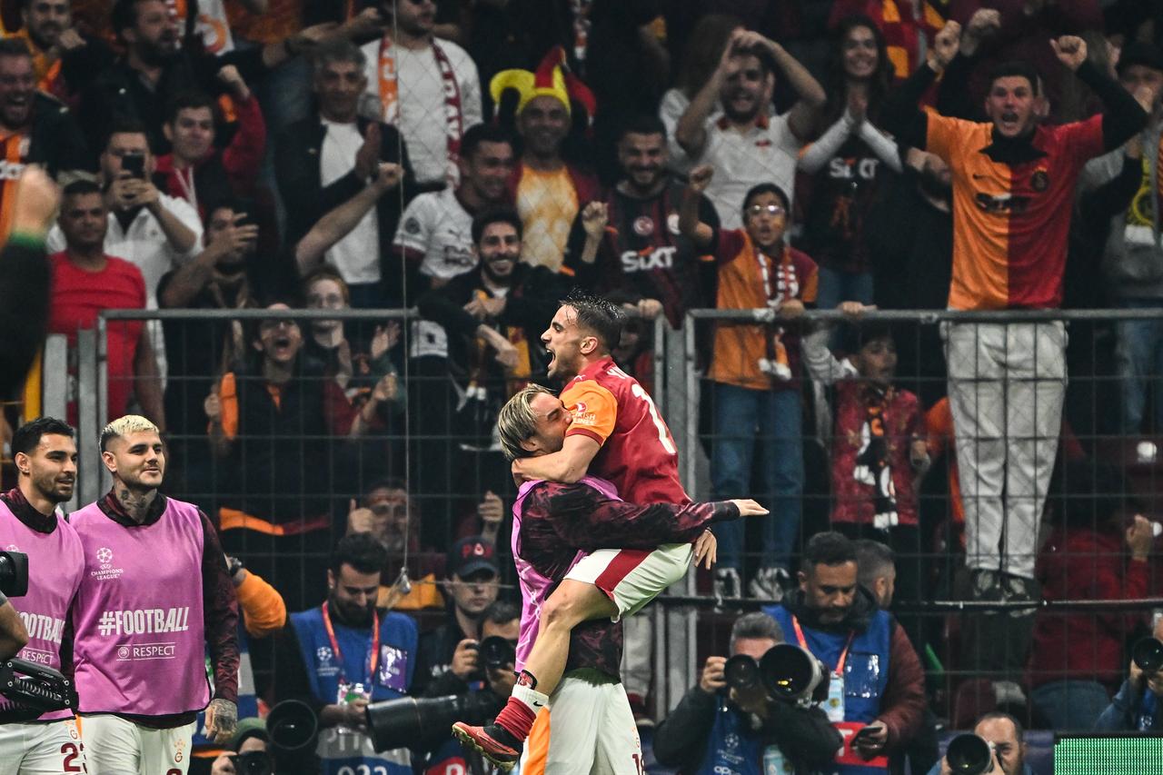 Yunus Akgun (R) of Galatasaray celebrates after he scores a goal with his teammates during the UEFA Champions League third-week football match between Galatasaray and Bodo/Glimt at RAMS Park in Istanbul, Türkiye on Oct. 22, 2025. (AA Photo)