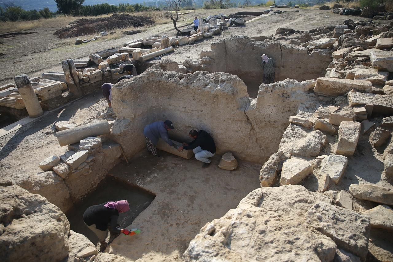 Archaeologists and workers uncover interior sections of ancient shops at Hyllarima’s agora, Kavaklidere, Mugla, Türkiye, Oct. 22, 2025. (AA Photo)