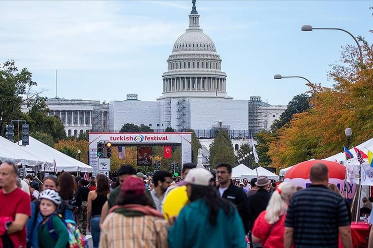 Visitors attend the 2023 edition of the Turkish Festival organized by the American Turkish Association of Washington, D.C. (ATA-DC), at Pennsylvania Avenue NW near the Capitol Building, Washington, U.S., Oct. 15, 2023. (AA Photo)