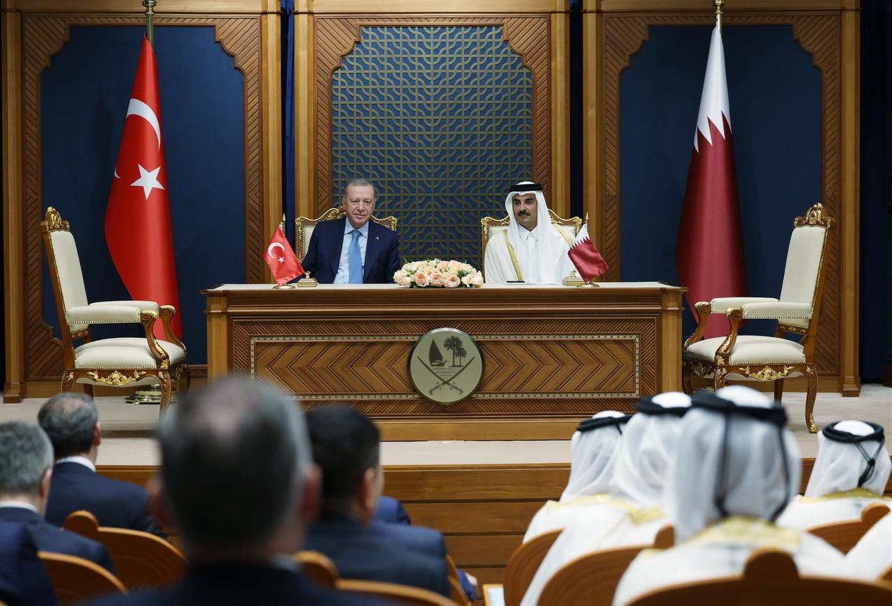 President Recep Tayyip Erdogan and Emir of Qatar Sheikh Tamim bin Hamad Al Thani attend a signing ceremony for agreements after their meeting in Doha, Qatar, Oct. 22, 2025. (Photo via Turkish Presidency/Murat Kula)