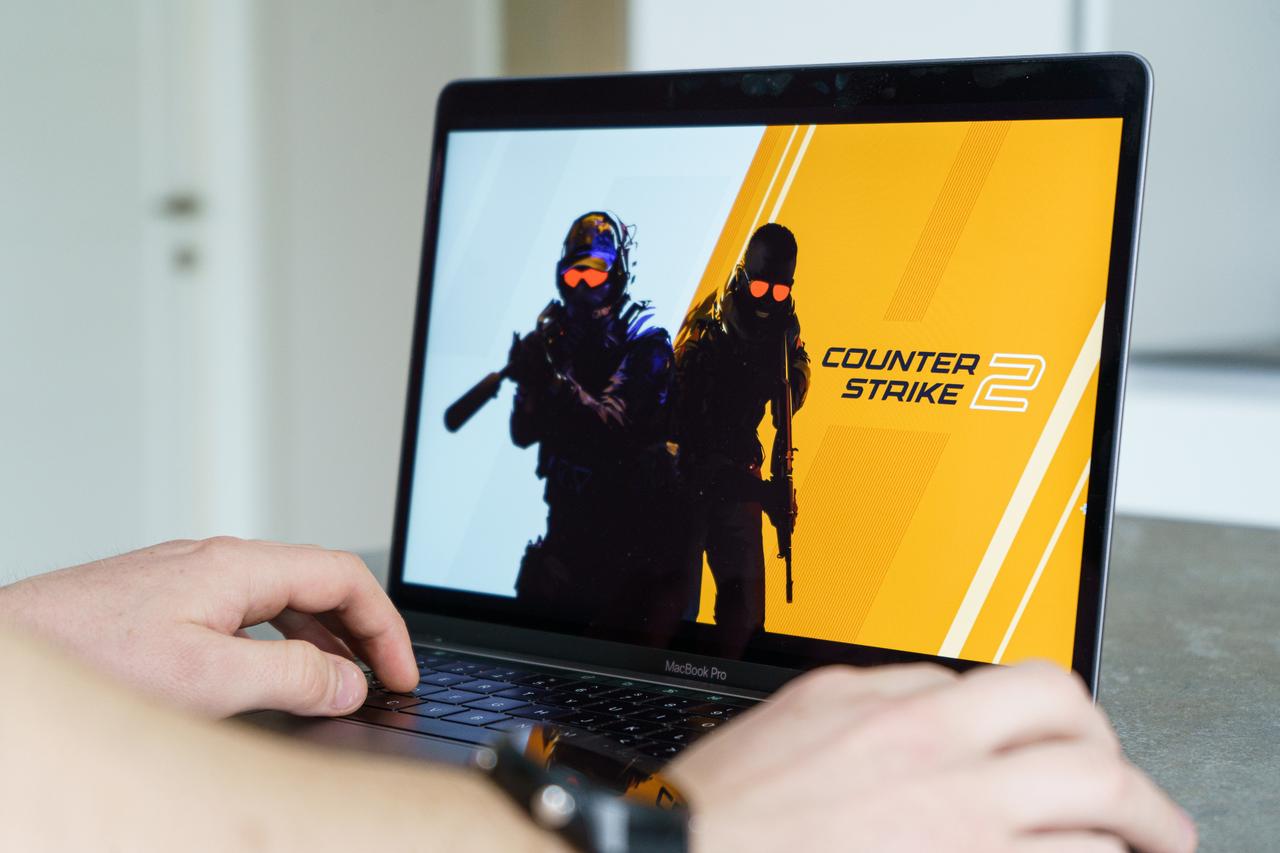 A player launches Counter-Strike 2 on a laptop. (Adobe Stock Photo)