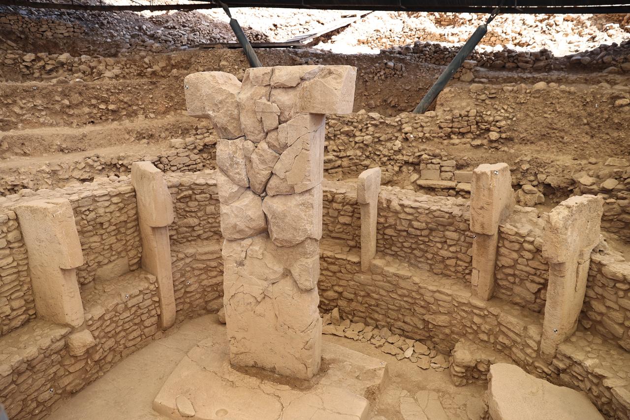 Excavation view inside one of Gobeklitepe’s circular enclosures shows the monumental “T”-shaped pillars carved over 11,000 years ago, protected today by modern roofing and ongoing conservation efforts, Sanliurfa, Türkiye, Oct. 23, 2025. (AA Photo)