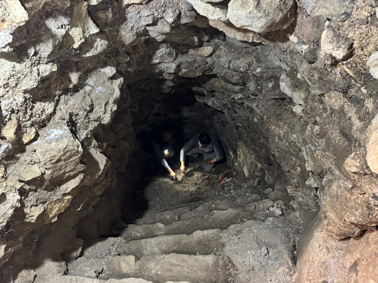 Archaeologists document findings inside the recently restored Roman-era secret passage at Harput Castle, Elazig, Türkiye, Oct. 23, 2025. (AA Photo)
