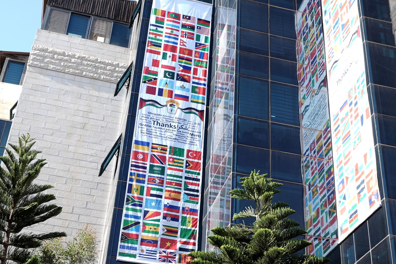 The Palestine Liberation Organization (PLO) displays the flags of countries that recognize Palestine at its headquarters in Ramallah, West Bank, Oct. 22, 2025. (AA Photo)
