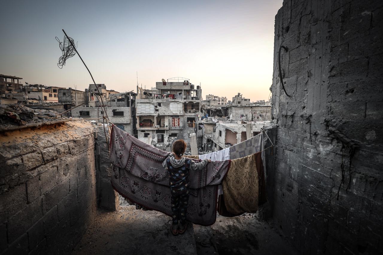 Palestinian family, whose home was destroyed as a result of the Israeli attacks, began cleaning and repairing to make it livable again despite all difficulties in Gaza City, Gaza, Oct. 23, 2025. (AA Photo)
