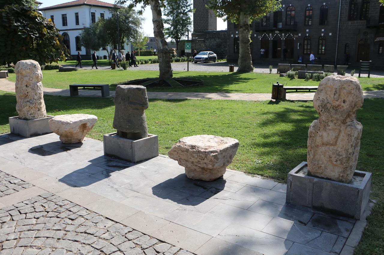 View of the “Road of Civilizations” exhibition at the Diyarbakir Museum featuring ancient stone artifacts, Diyarbakir, Türkiye, October 24, 2025. (IHA Photo)
