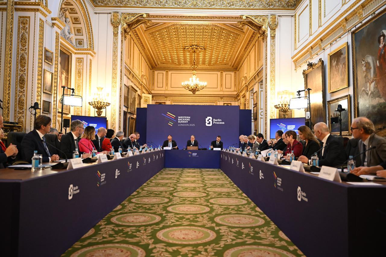 Britain's Prime Minister Keir Starmer (C) flanked by German Chancellor Friedrich Merz (CL) and Montenegro's Prime Minister Milojko Spajic (CR) hosts the plenary session of the Western Balkans Summit in central London, United Kingdom on Oct. 22, 2025. (AFP Photo)