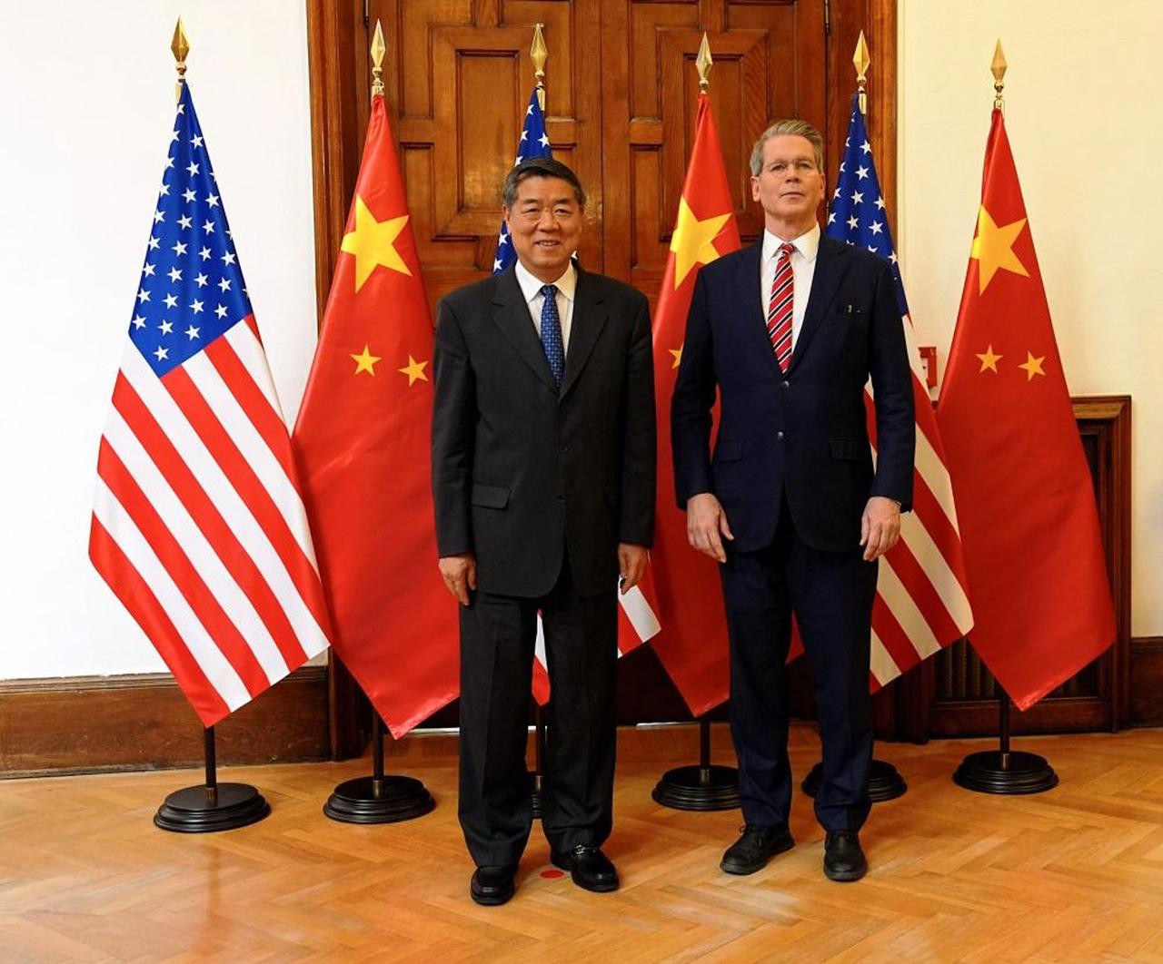 U.S. Treasury Secretary Scott Bessent (R) and Chinese Vice Premier He Lifeng (L) pose for a photo during bilateral trade talks in Kuala Lumpur, Malaysia, October 25, 2025. (Photo via X/@CGTNOfficial)