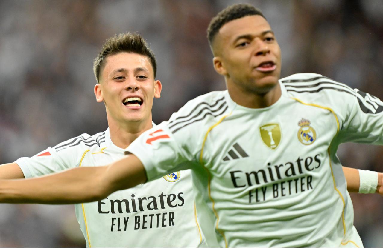 Kylian Mbappe of Real Madrid celebrates with his teammate Arda Guler after scoring a goal which later disallowed for offside during La Liga week 10 football match between Real Madrid and Barcelona at Santiago Bernabeu Stadium in Madrid, Spain, October 26, 2025. (AA Photo)