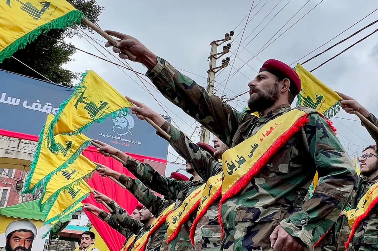 Fighters of the Lebanese Shiite group Hezbollah parade during a ceremony to commemorate the partys fallen leaders in the Lebanese village of Jibshit, about 50 kilometres south of the capital Beirut on Feb. 15, 2024. (AFP Photo)