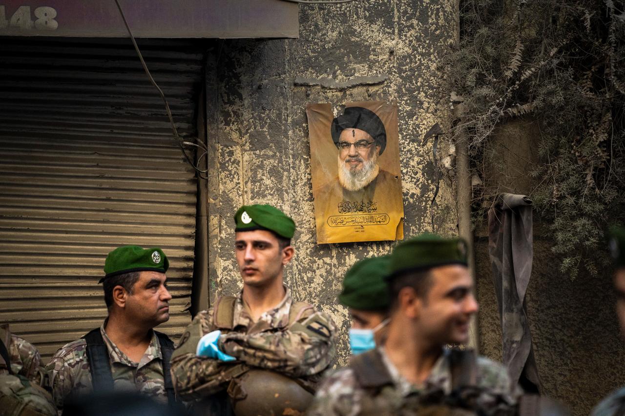 A portrait of Hezbollah's ex-leader Hassan Nasrallah on the wall at the site of the Israeli strike in Basta, central Beirut, November 23, 2024. (AFP Photo)
